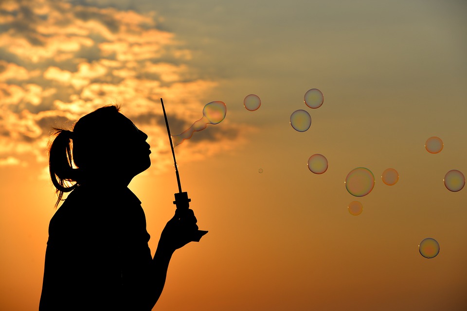 Women Blowing Bubbles